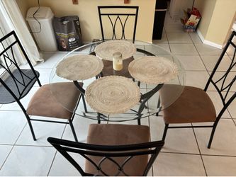 Glass dining table with 4 chairs