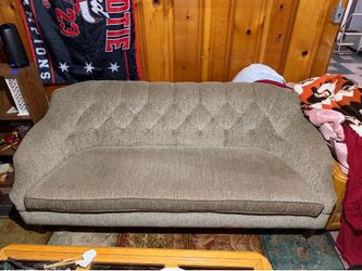Vintage tufted brown sofa
