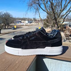 Puma black and white shoes
Men's 11