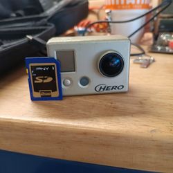 Older hero go Pro camera with new style accessories