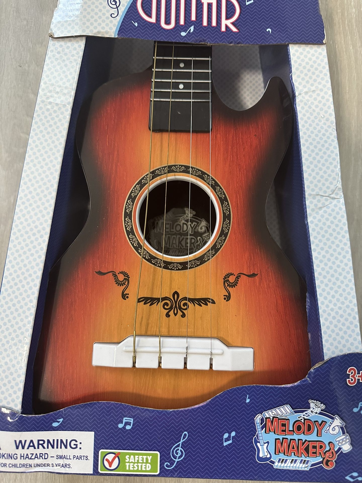 Melody maker acoustic guitar on sale toy