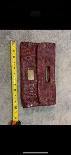 CA. NINE WEST CLUTCH. NOT USED.