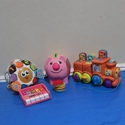 VTECH Bright Lights Soccer Ball / VTech Pop and Sing Animal Train / Fisher-Price Learning Piggy Bank 