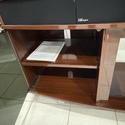 modern TV stand with speakers.
