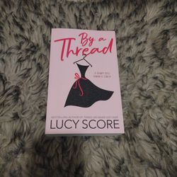 By a Thread By Lucy Score