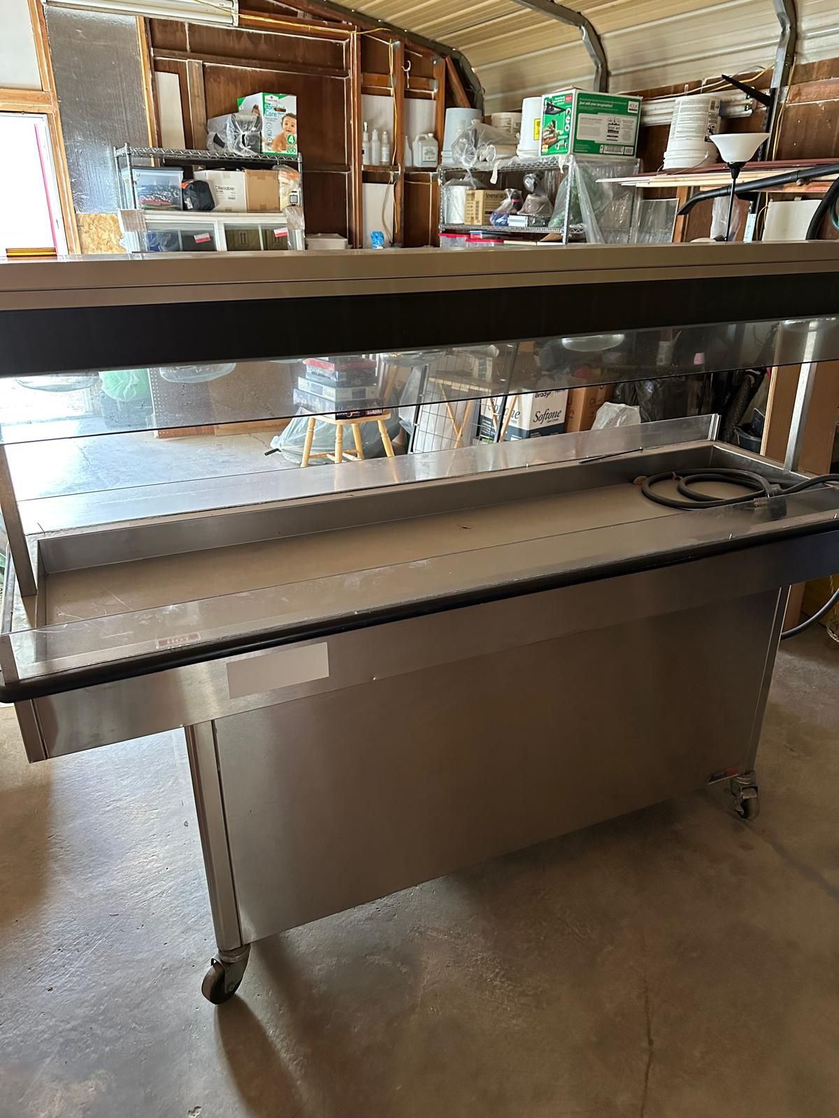 Steam table with rotisserie