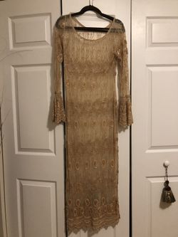 Beautiful beaded dress. Gold . Size 10/12