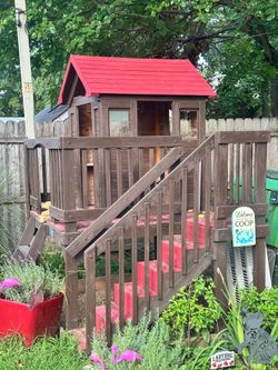 Beautifully stained “Backyard Discovery” playhouse