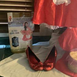 Halloween CostumesUSA Lil’ Red Riding Hood size Large 12-14 complete deluxe costume including dress, hooded cafe, red shoes, baskets  With red cloth l