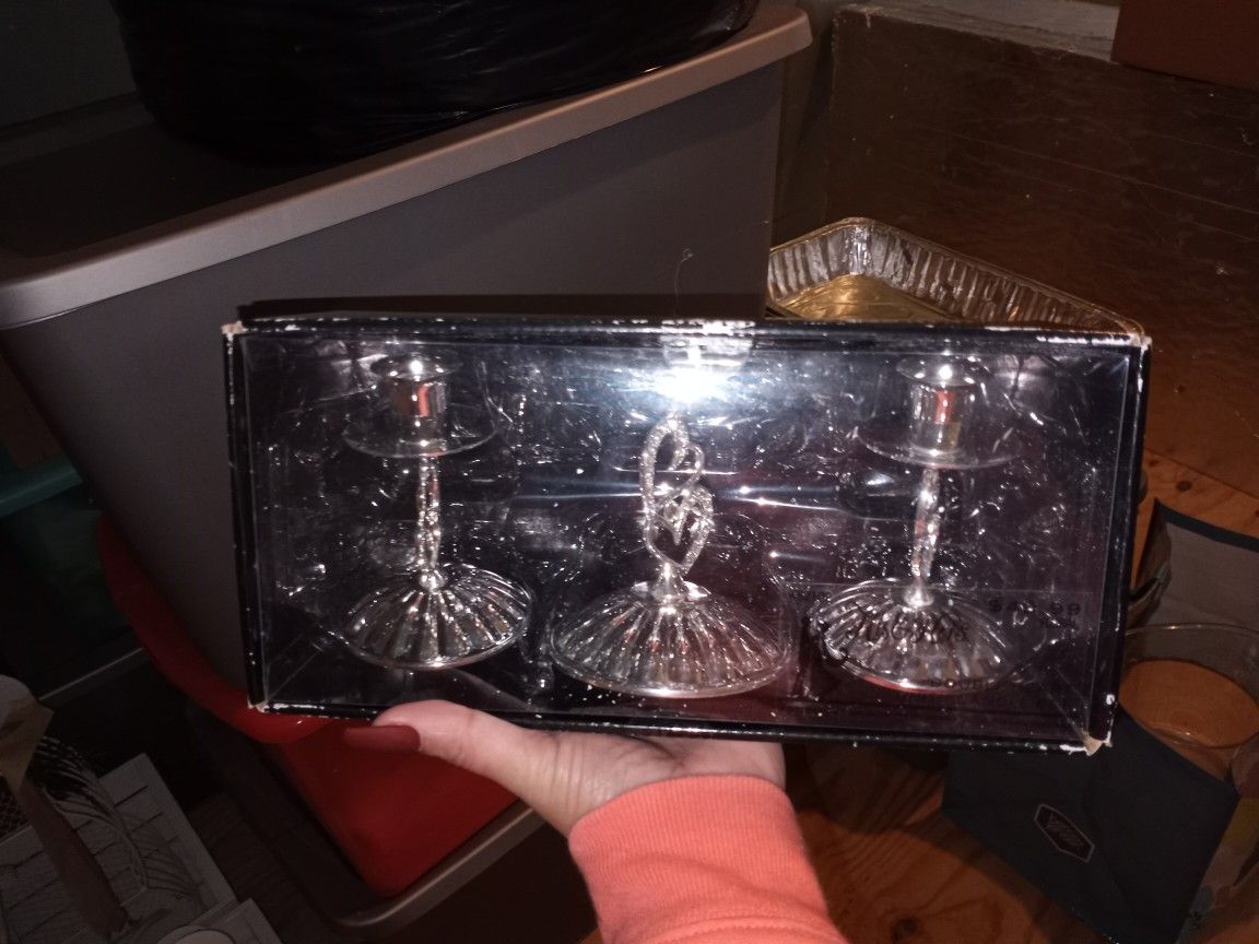 metal candle holders with candles for wedding or elegant event