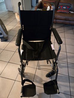 Transport wheelchair