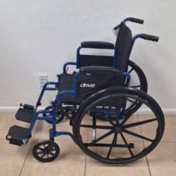 Wheelchair with Swing-Away Footrests and Flip-Back. Arms