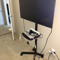 TCL Roku 43 Inch Tv Will Rollable Mobile Stand