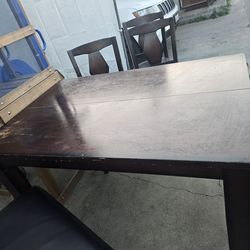Wooden table 150 obo takes it
