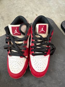 Nike air Jordan red and white cleats 5.5y
