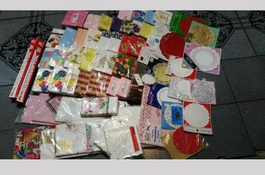 Napkins, table covers and aluminum foil