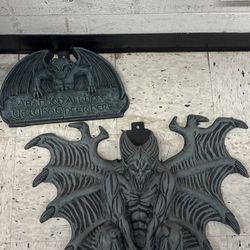 Two Halloween Plastic Gargoyle Signs