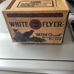 Clay Pigeons And Holders 