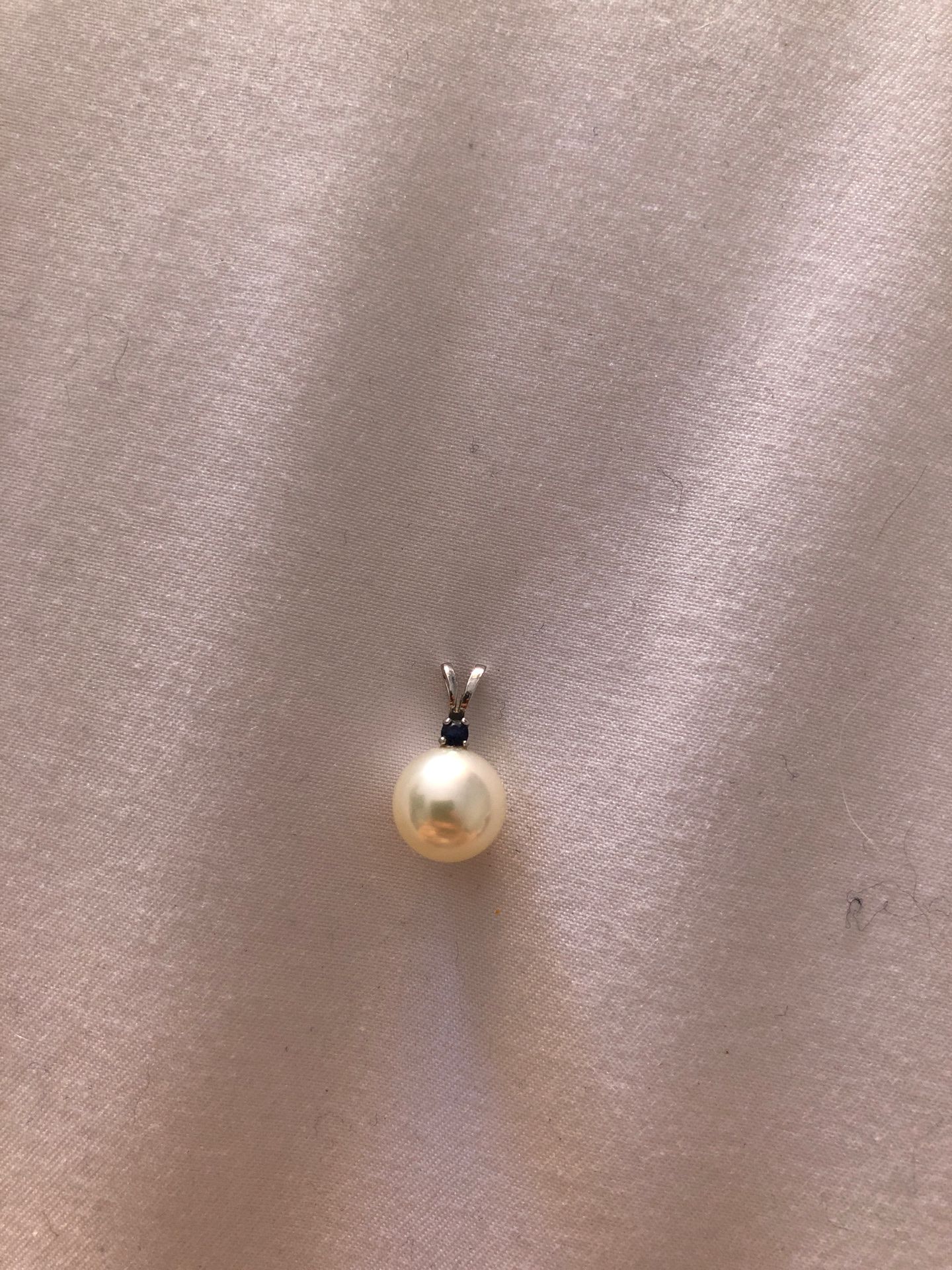 Cultured pearl and sapphire pendant