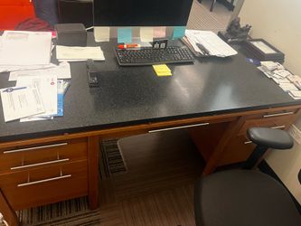 Wooden desk with granite top