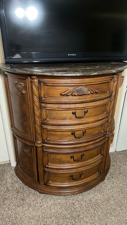 Wooden dresser with marble/stone top