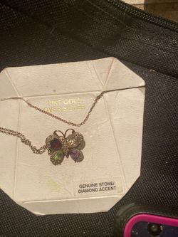Women’s butterfly necklace 18karat gold with ruby , amethyst, peridot, and cubic zirconia with diamonds !!