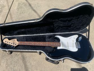 Electric guitar with case