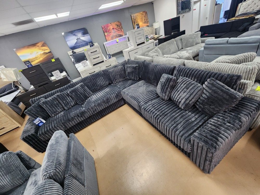 Jumbo Curdoroy Sectional Dark Grey. Have Other Colors