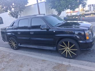 2004 cadilac scalade titulo limpio