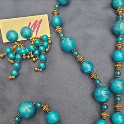 Mary Garvin signed with tags necklace and earrings set.