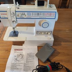 Singer Sewing Machine Model #5932 W/Pedal And Instruction Booklet $55.00