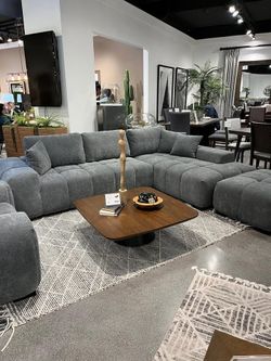 Luxurious fabric upholstered 2 pc large sectional adds rich texture and a high-contrast finish