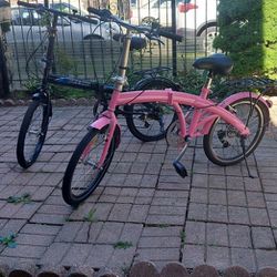 To folding bike. Pink and black