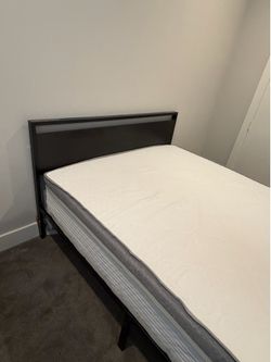 Queen Metal Bed Frame and soft mattress