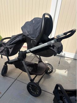 Evenflo double stroller w/ car seat & base