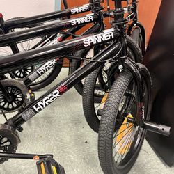 Hyper 20" Spinner BMX Bike Sturdy Frame w/ Front and Rear Pegs, Ages 8-12, Gloss Black.