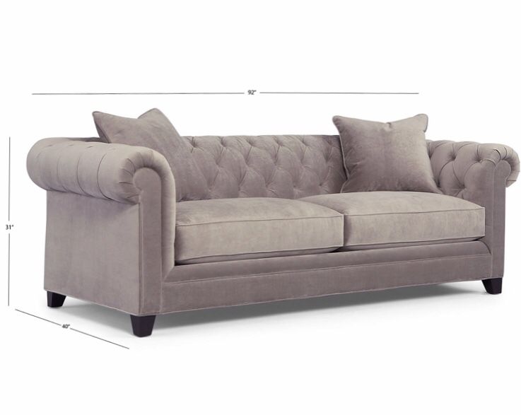 Grey tufted couch—Martha Stewart “Saybridge” collection