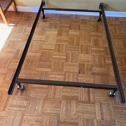 Bed Frame-adjustable to Twin or Full / Pickup is in Lake Zurich 