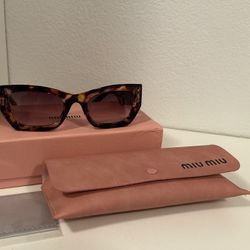 miumiu women’s Sunglasses MU 09WS 