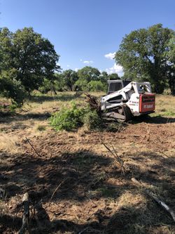 Land clearing, pears, trenching, finish grading, gravel spread