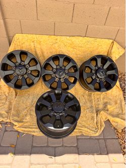 New 17" x 8" Factory OEM 8-spoke All Black Wheels Take-offs from 2024 Dodge Ram 2500 Power Wagon