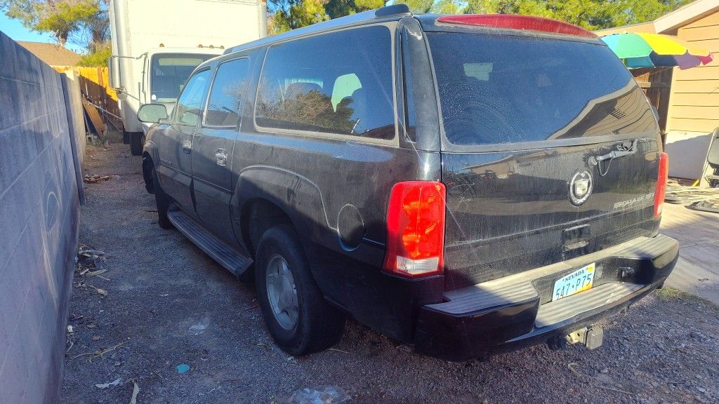03 Escalade 3rd Brake Light for $80, Turn Signal Mirrors for $50 Each, and More.