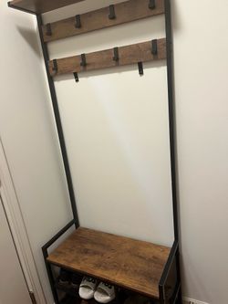 Shoe rack with coat hanger