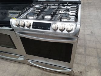 LG stainless steel 5-burner dual-fuel slide-in range  (dent on right side) - Free delivery