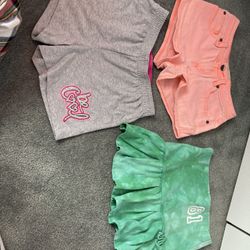 Two pairs of shorts one skirt for girls size 10 and 10/12 youth