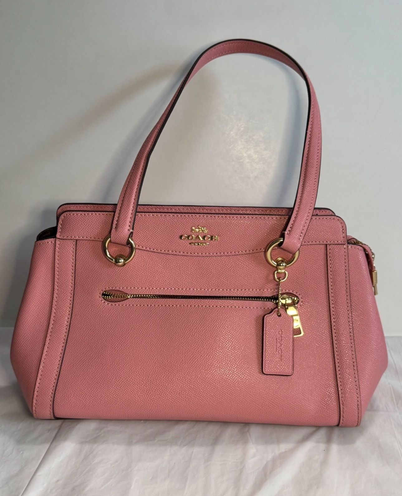 Pink Coach Handbag With Gold Hardware