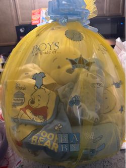 Baby boy ballon with lots of stuff in it