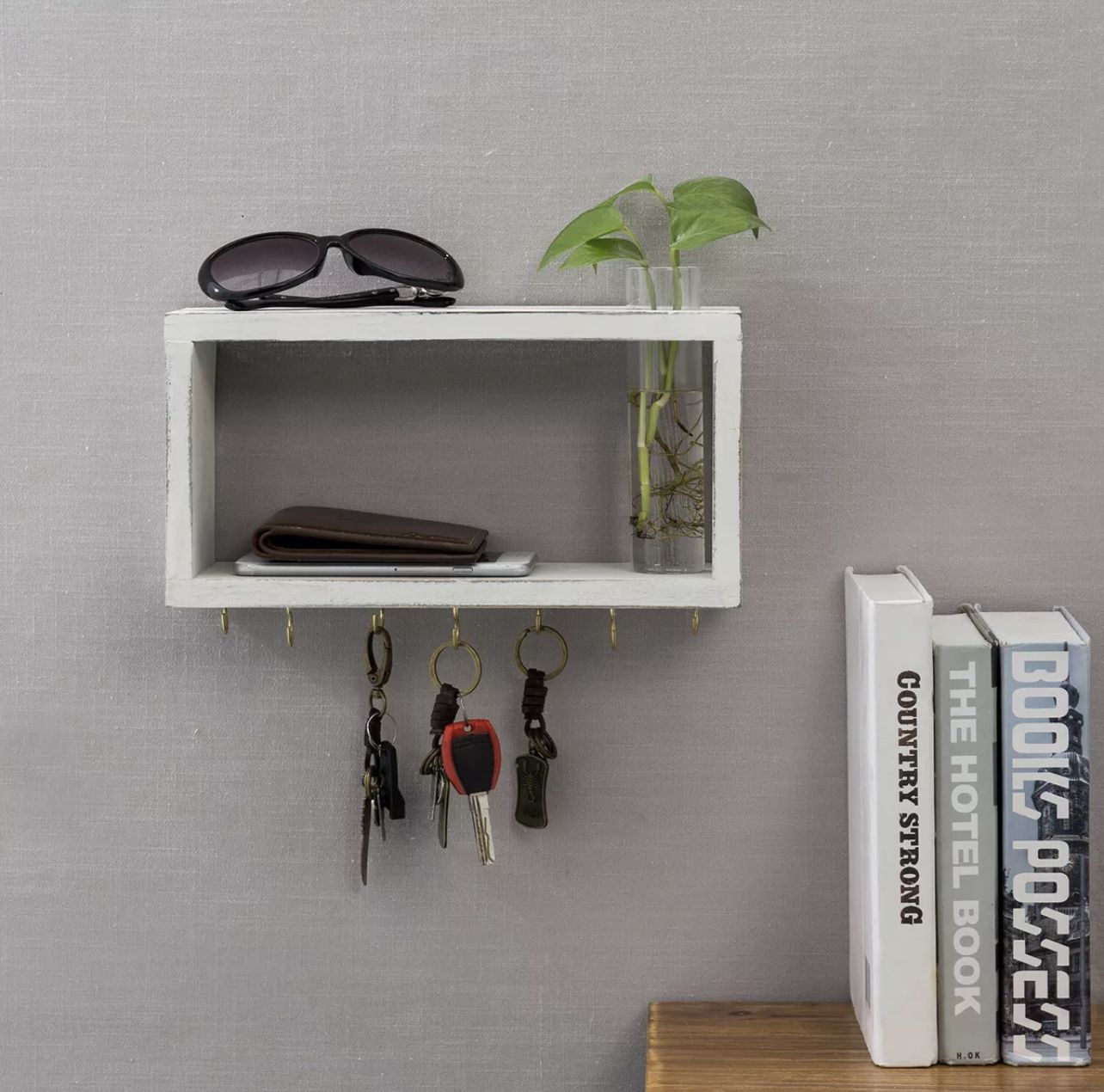 wall mounted shelf organizer W/ 7 brass key hook and a glass vase