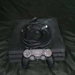 PS4 Pro With controller .