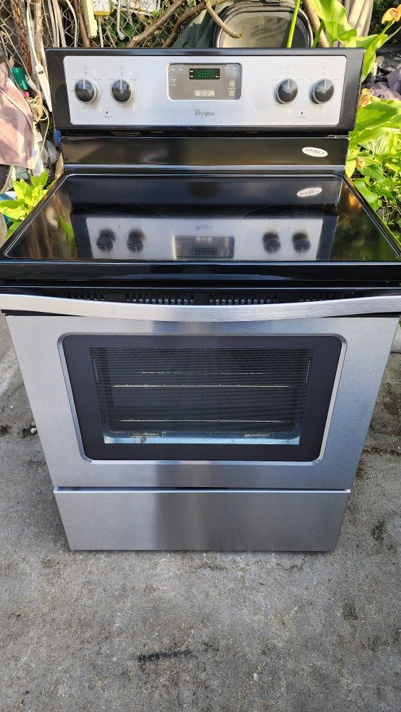 Preciosa Estufa Electrica Whirlpool Luz 220V Seminueva Plancha De Vidrio Lista Para Usar Super Limpia Trabaja Bien Los 4 Quemadores Y El Horno $180